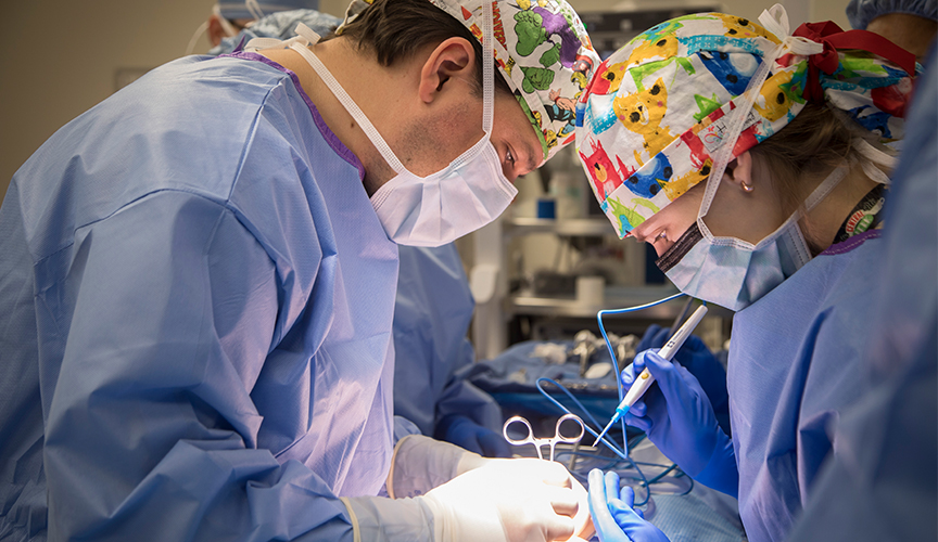 Dr. Joseph Gleason performing a robot surgery